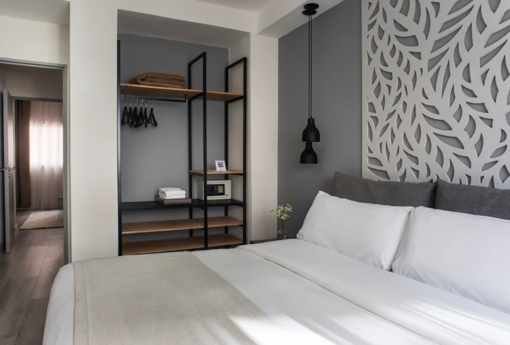 Habitación Ejecutiva de Classic Rochester con vestidor y estantería en Buenos Aires